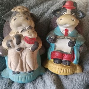 His and her vintage cow piggy banks
